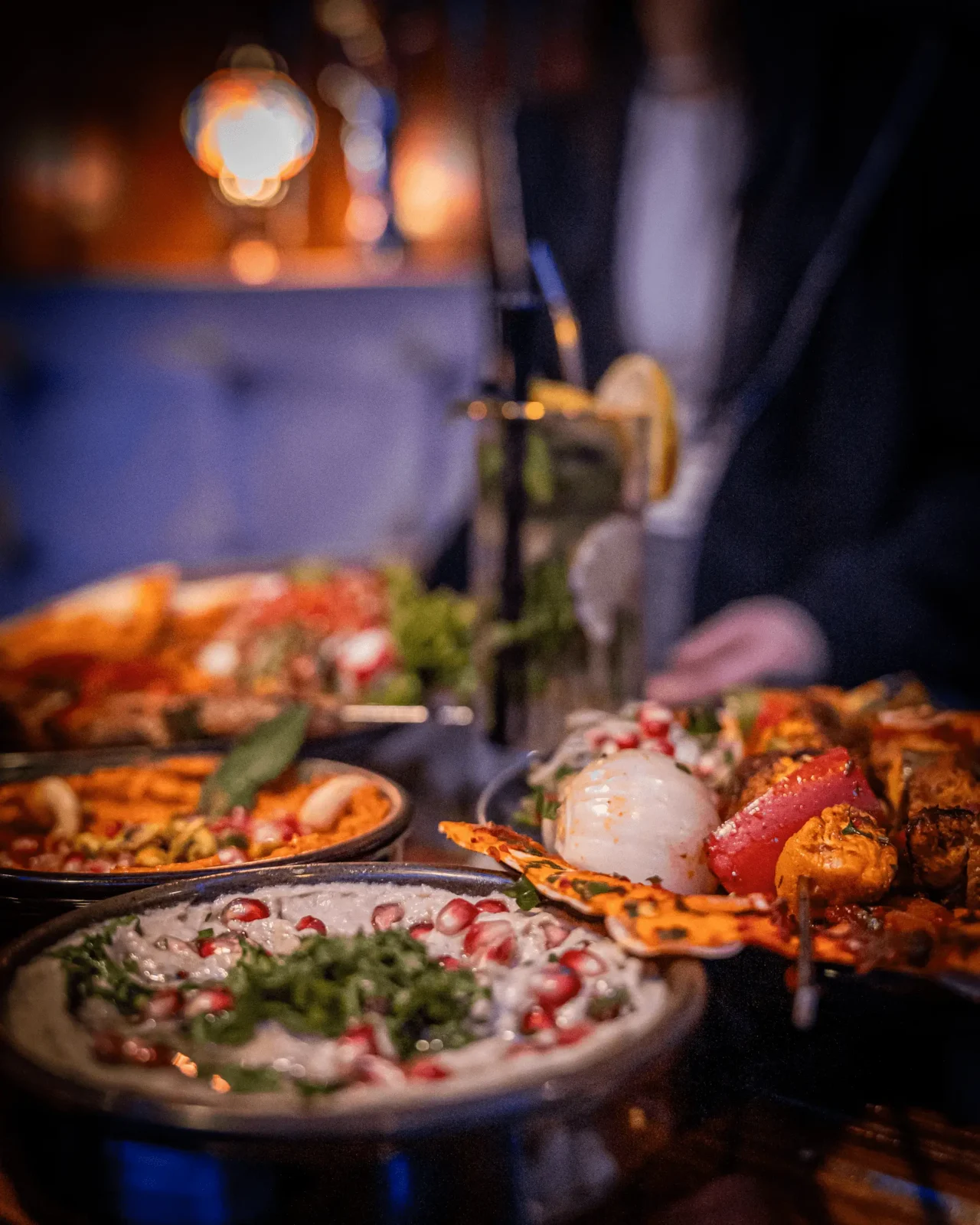 Home 18 Grill dishes and a mojito at Mazazik Amsterdam